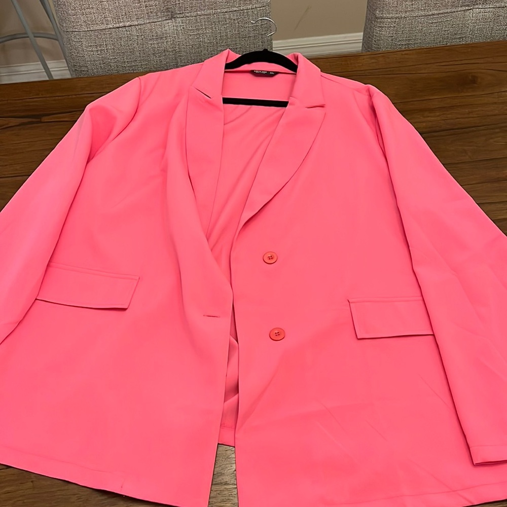 Hot pink spring or summer suit.